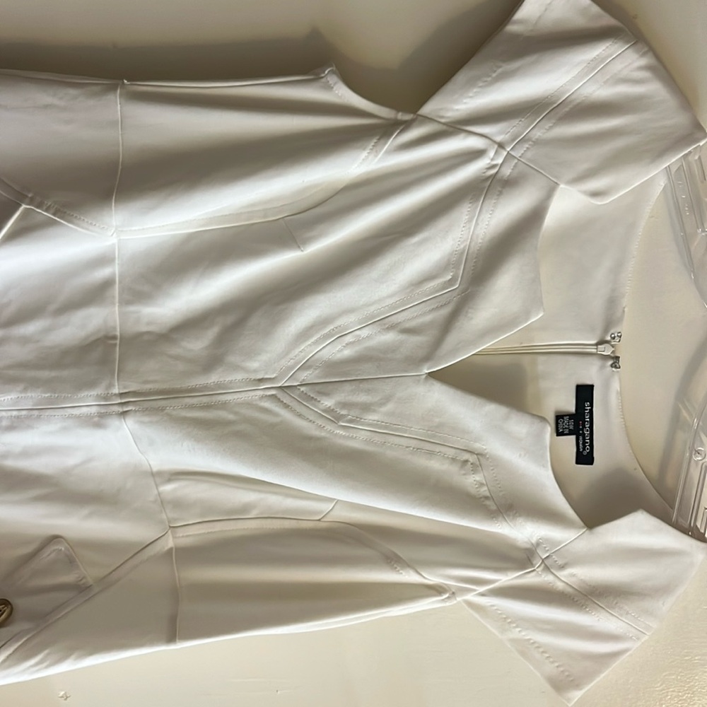 Sharagano Woman’s Dress size 14W
Good condition